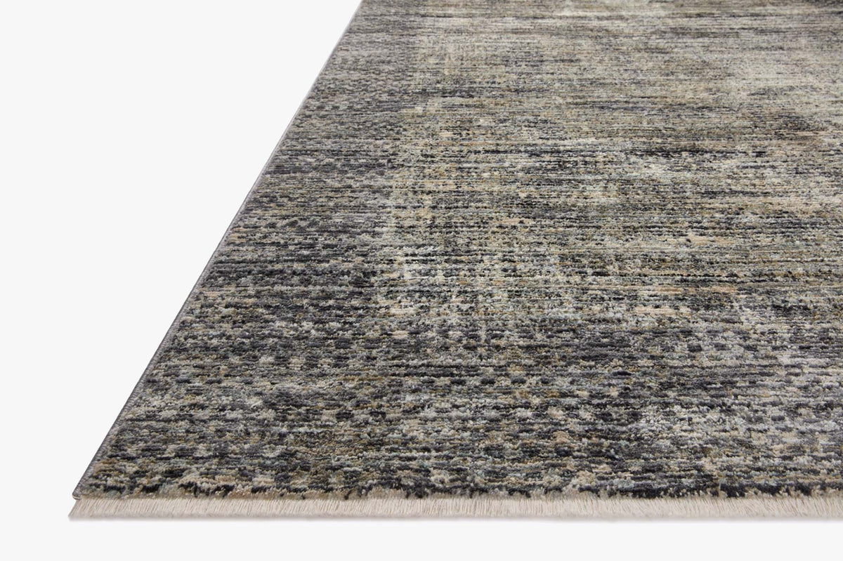 Slate and gray area rug with textured horizontal weave, angled corner view