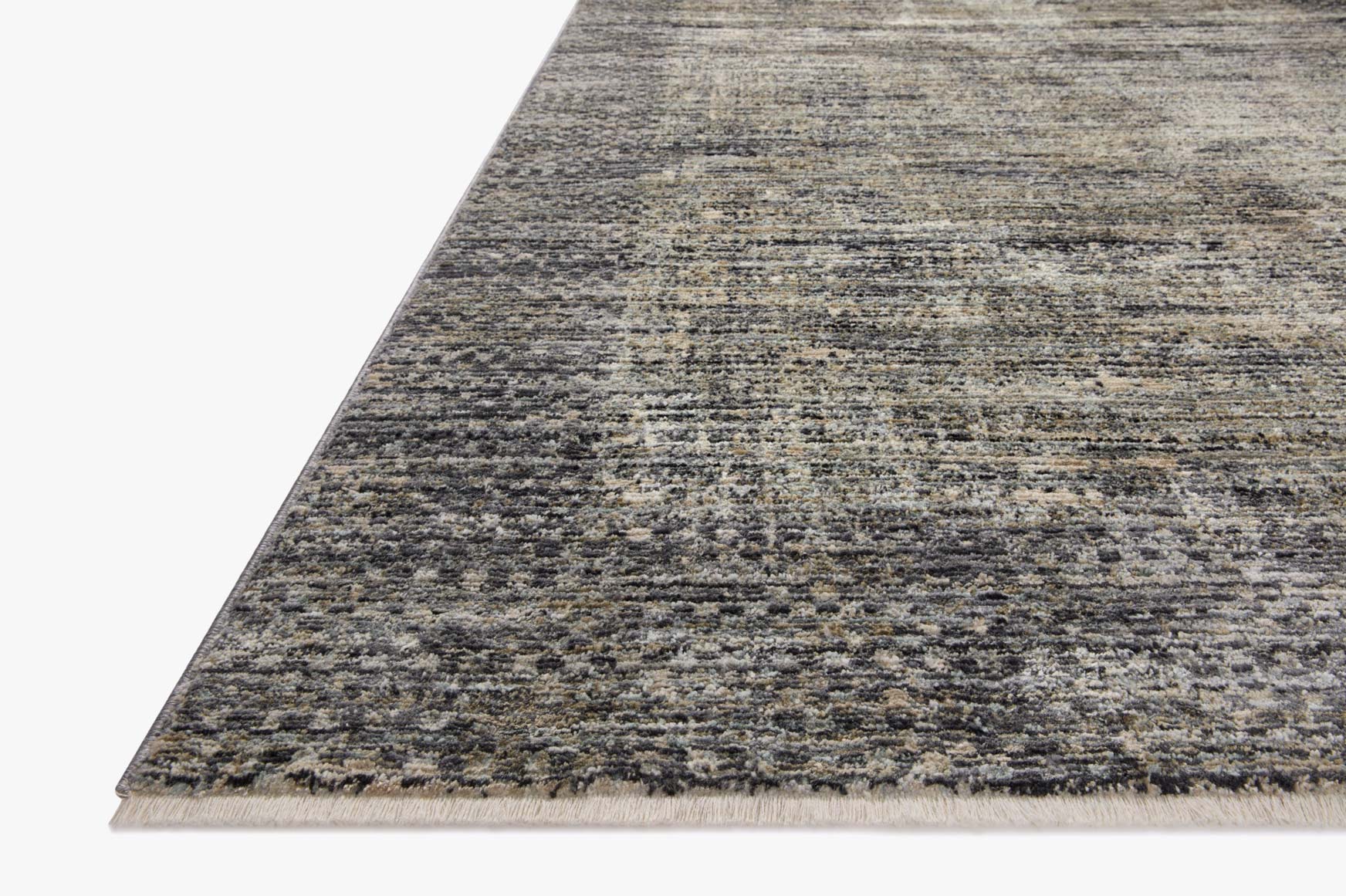 Slate gray textured accent rug with speckled flatweave, corner edge view