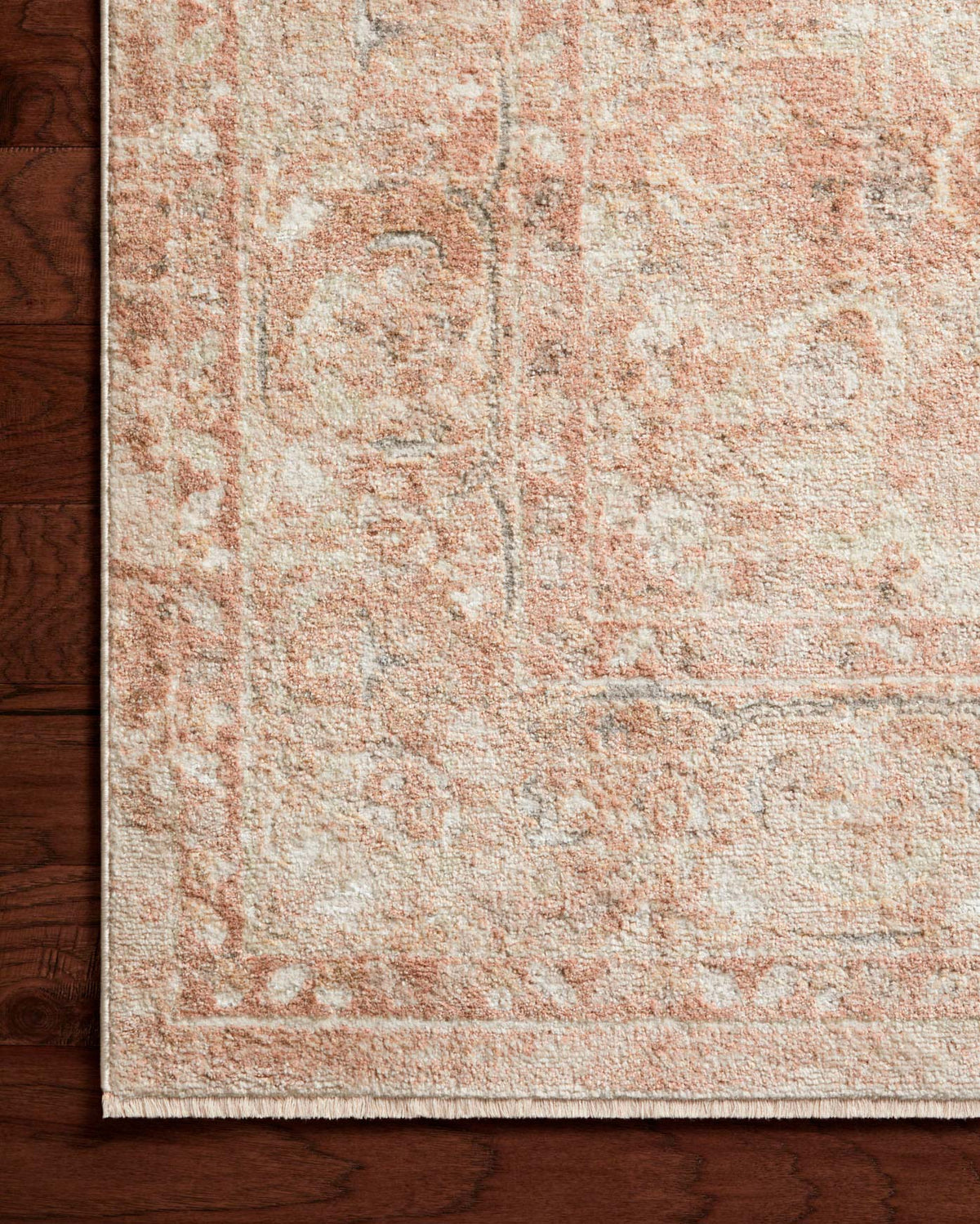 Terracotta and natural runner rug with distressed medallion design and woven pile