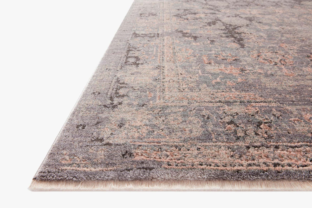 Charcoal and slate abstract area rug with short fringed edge, distressed pattern