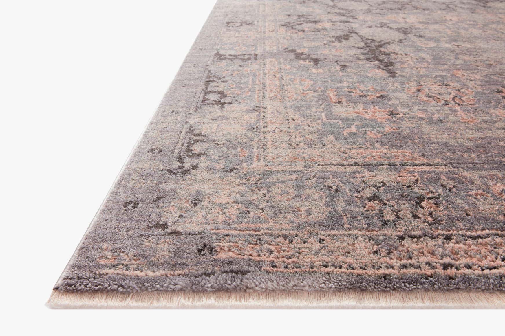 Charcoal and slate abstract accent rug with distressed texture and short fringe edge