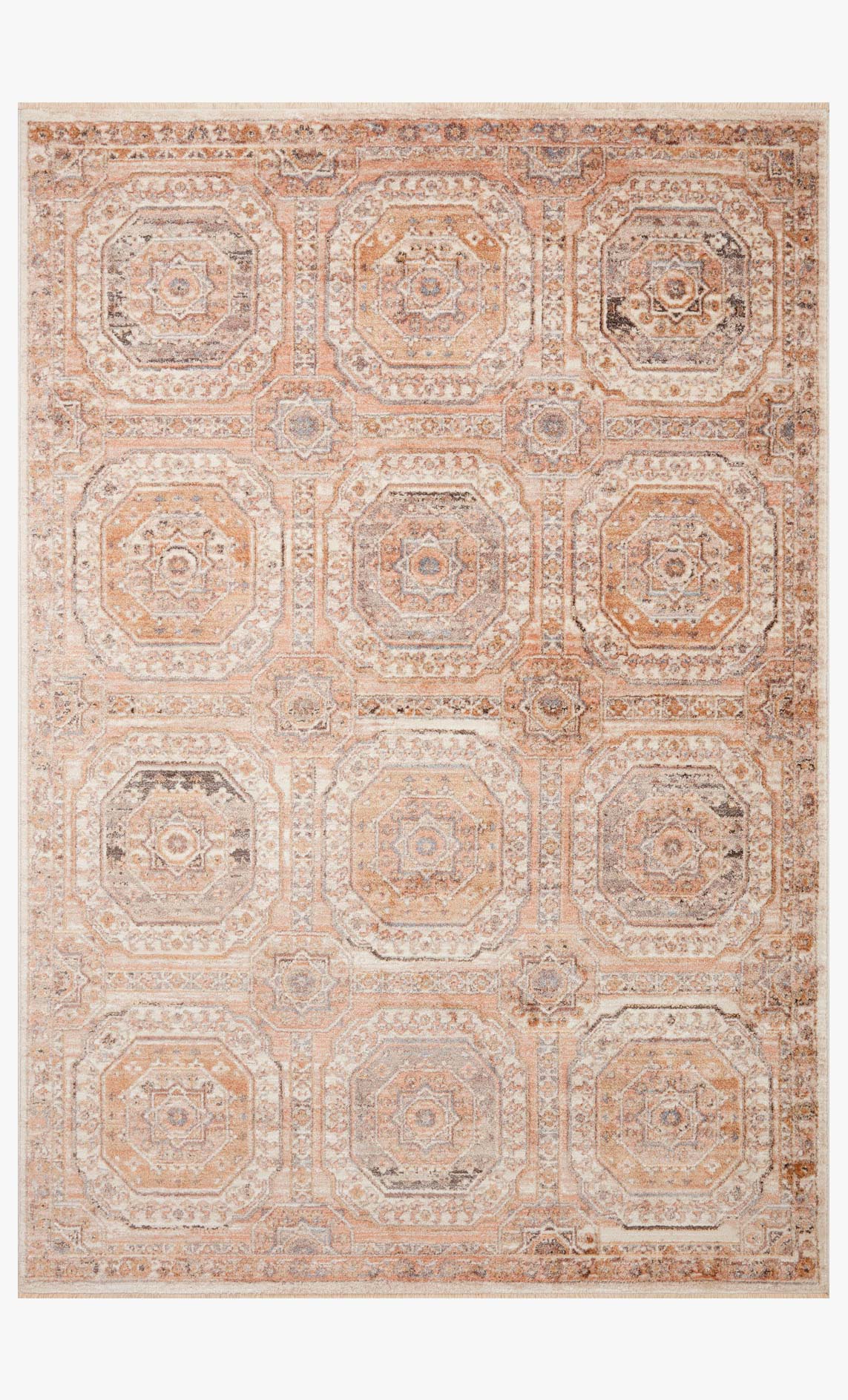 Apricot area rug with repeating medallion lattice pattern, distressed tones, flat woven look