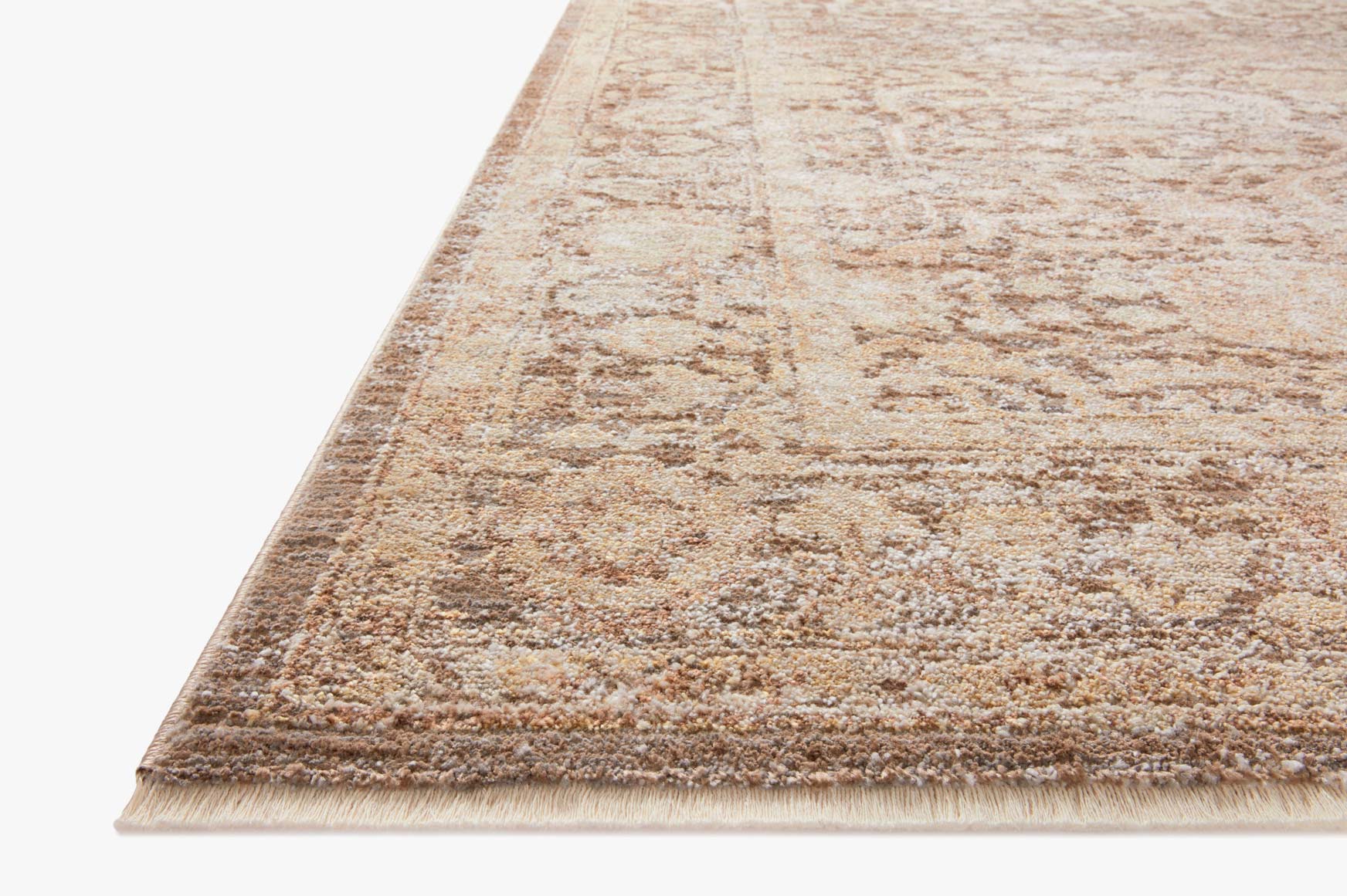 Tan and beige distressed area rug with mocha undertones and textured short pile