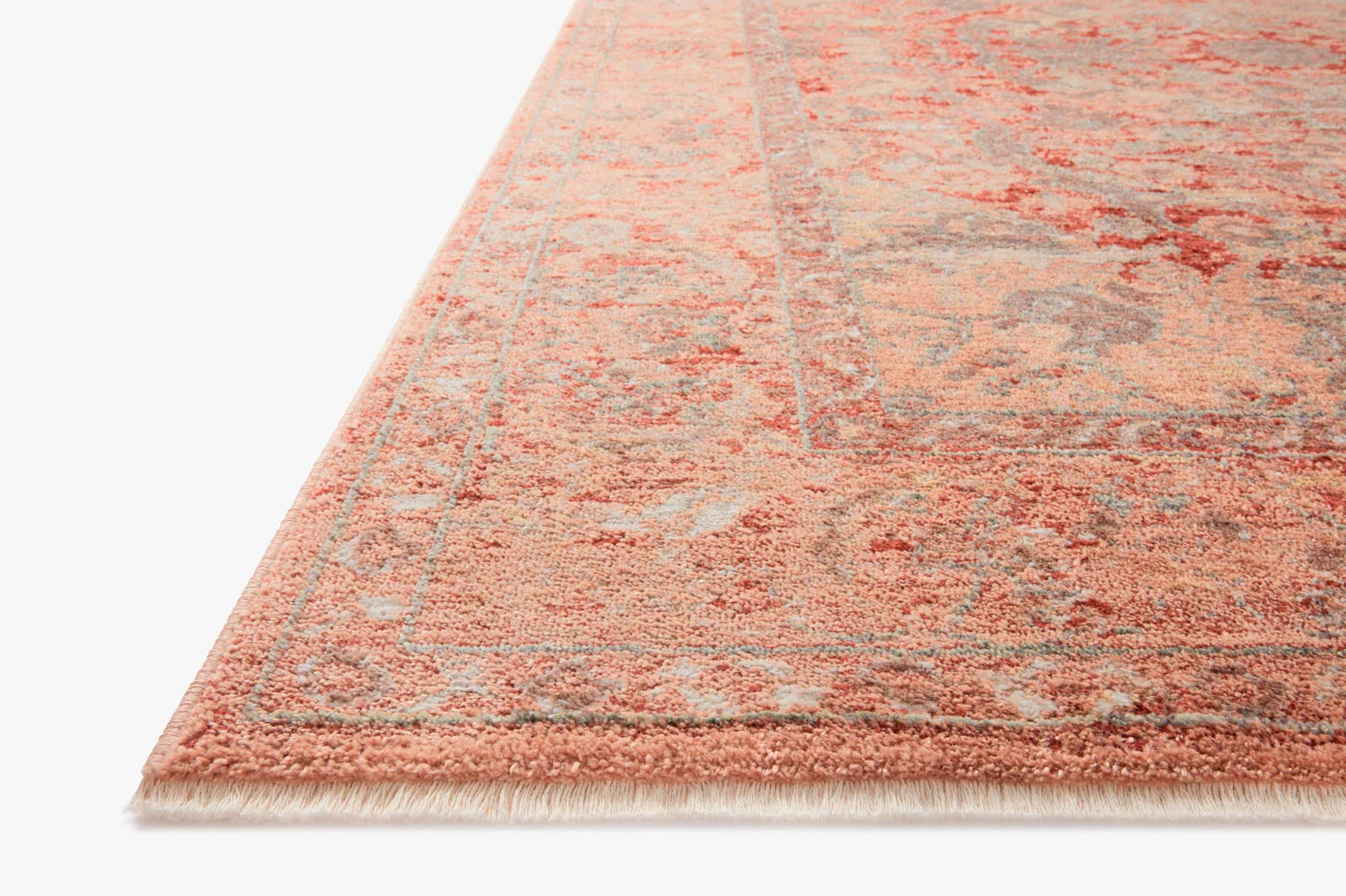 Spice orange runner rug with distressed oriental pattern and short fringe edge