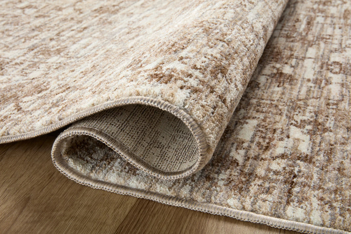 Traditional rug folded edge detail showing woven texture and short fringe