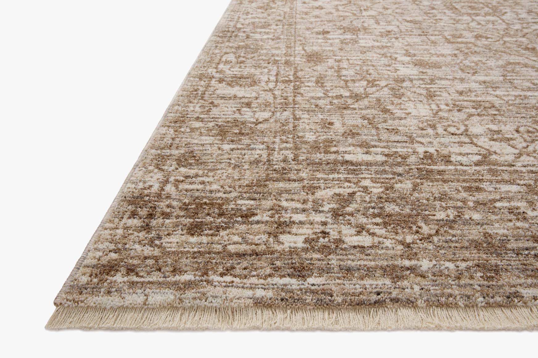 Traditional area rug with beige and brown distressed pattern; short fringe edge