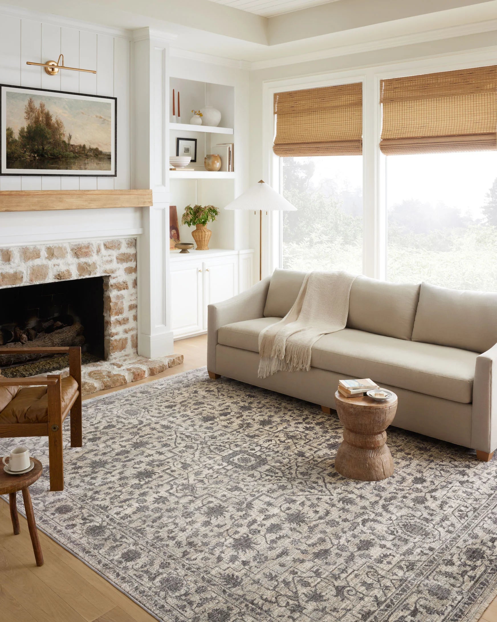 Traditional accent rug with distressed geometric pattern in mist and charcoal, flat weave