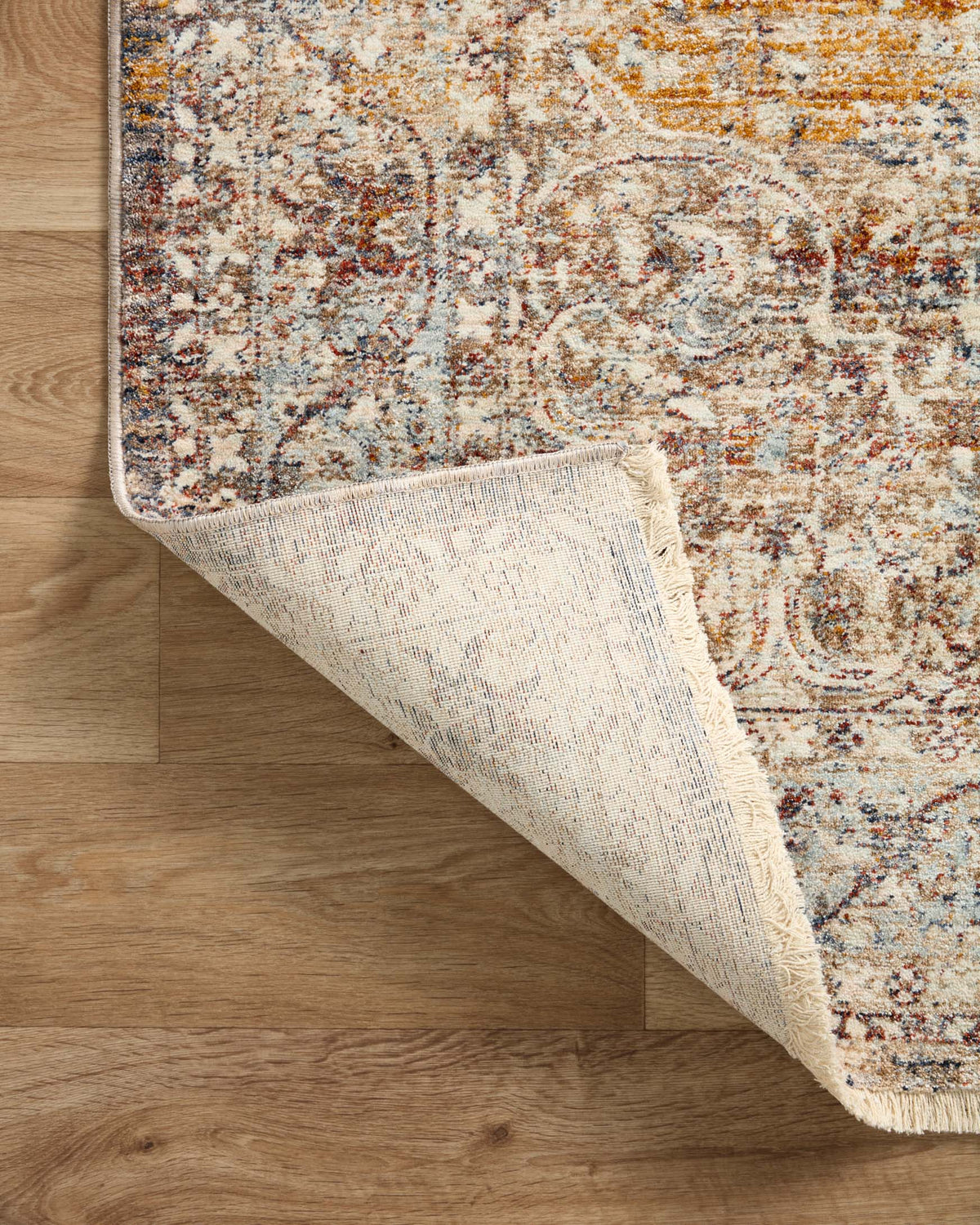 Reversible rug edge with textured backing and multicolor top layer