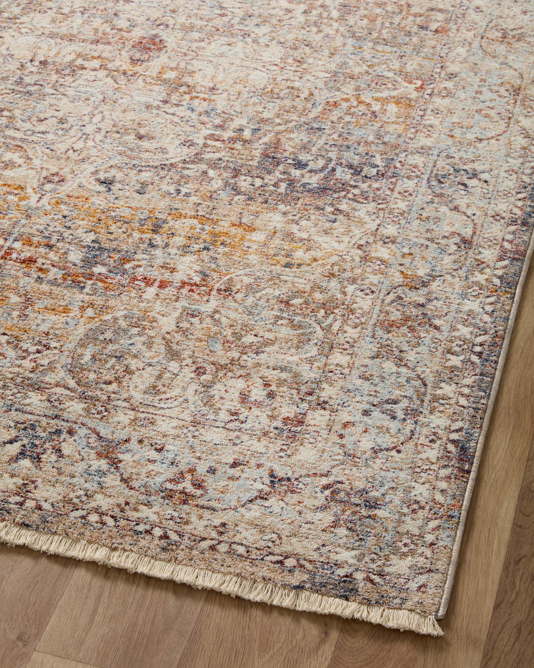 Traditional runner rug flat view with distressed beige and multicolor speckled pattern