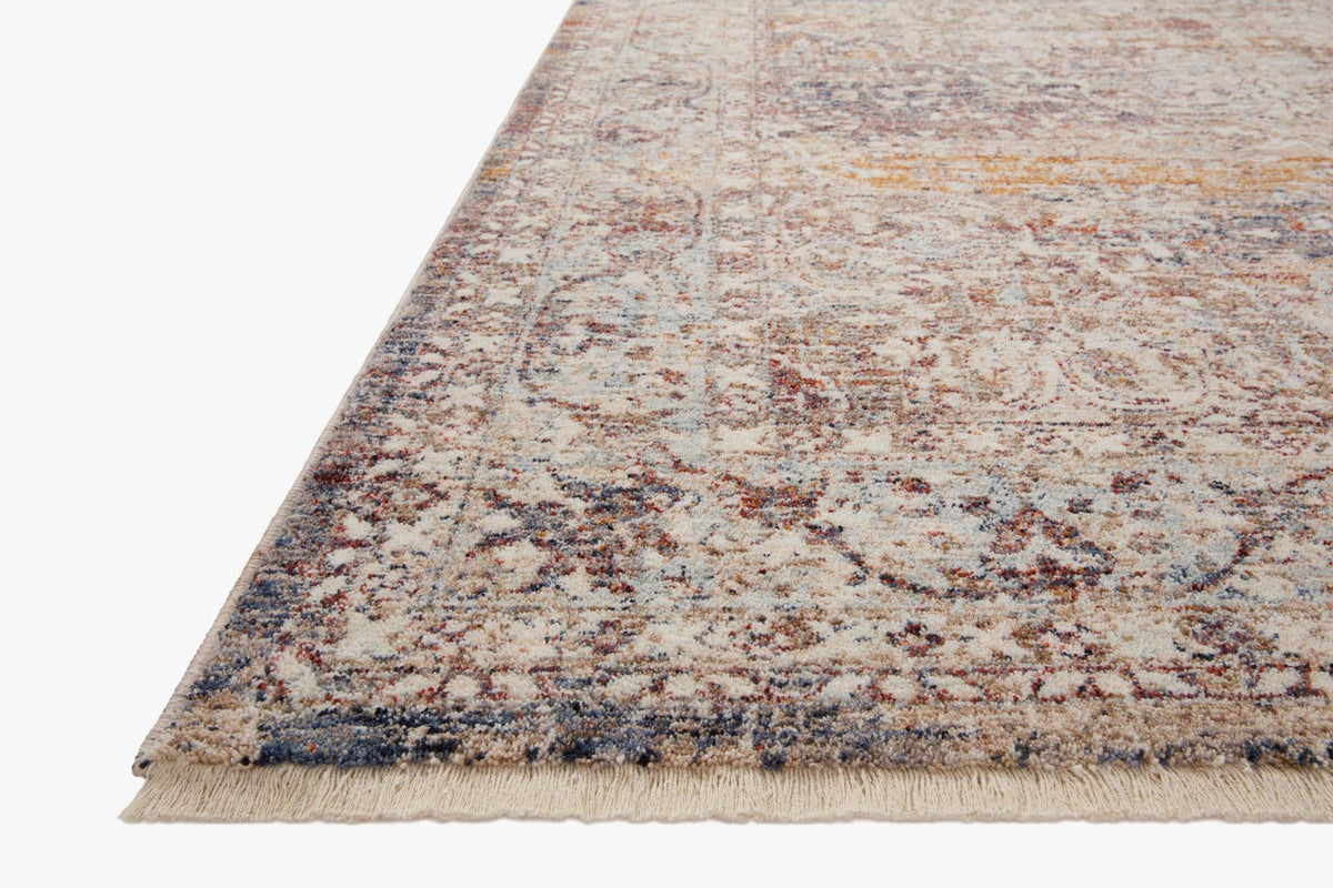 Traditional accent rug with cream, navy, and orange distressed pattern and fringed edge