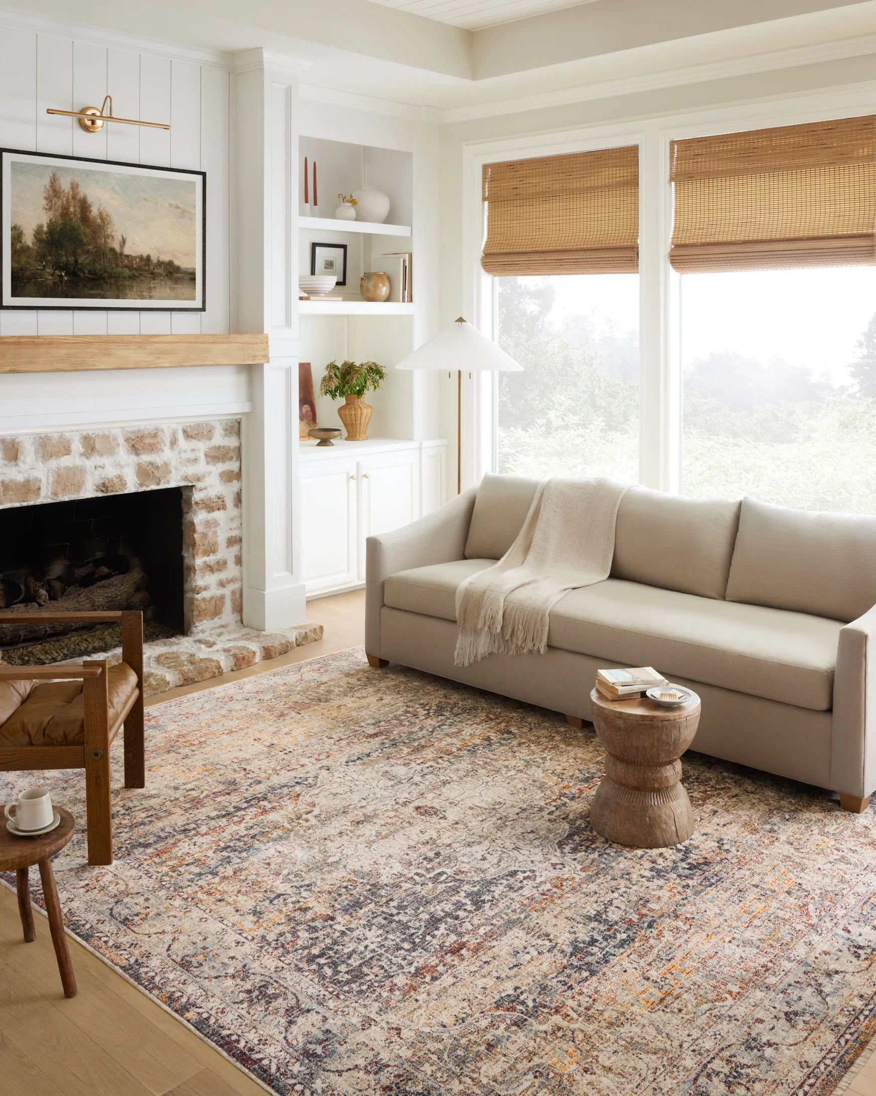 Traditional distressed area rug in natural beige with multicolor speckled design