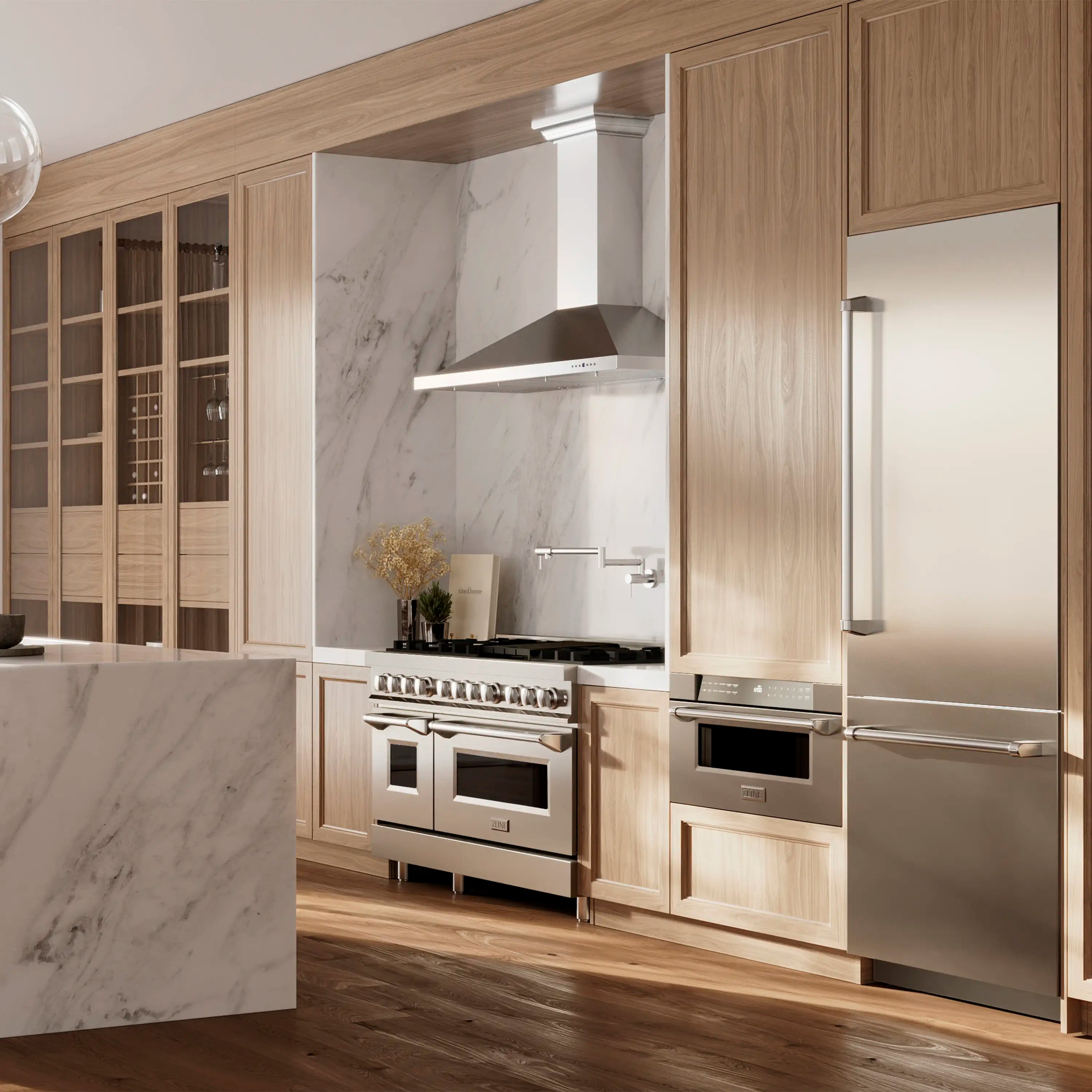 Built-in bottom freezer refrigerator in stainless steel with graphite gray interior.
