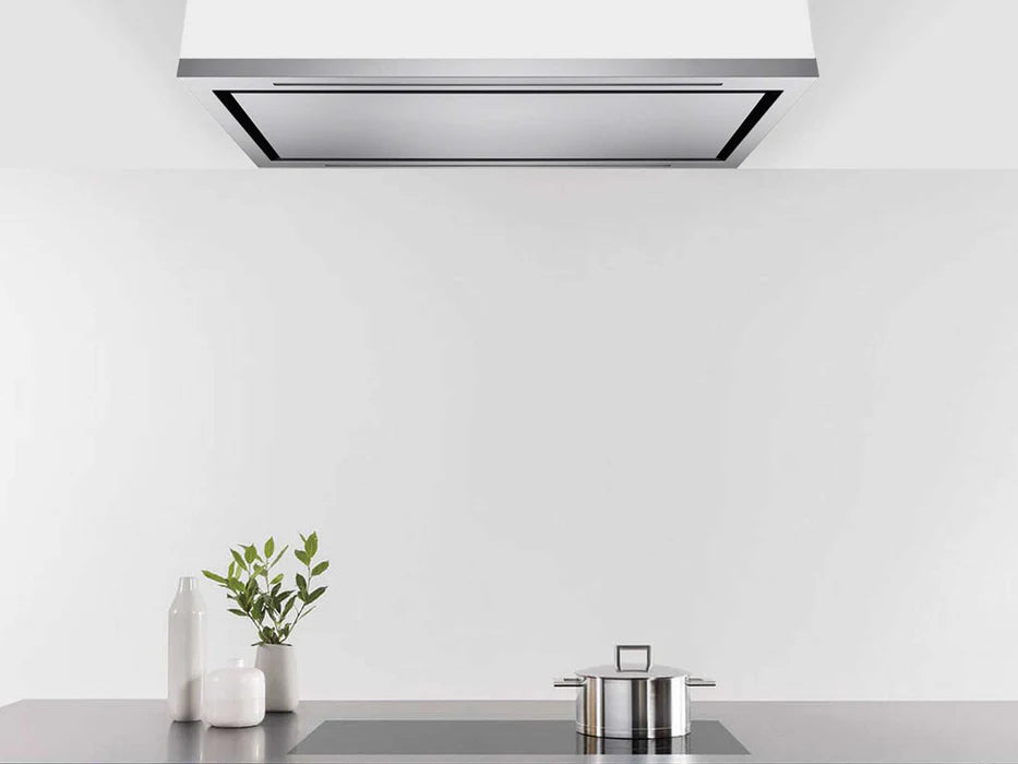 Ceiling-mounted range hood underside with black trim and LED lights above kitchen counter