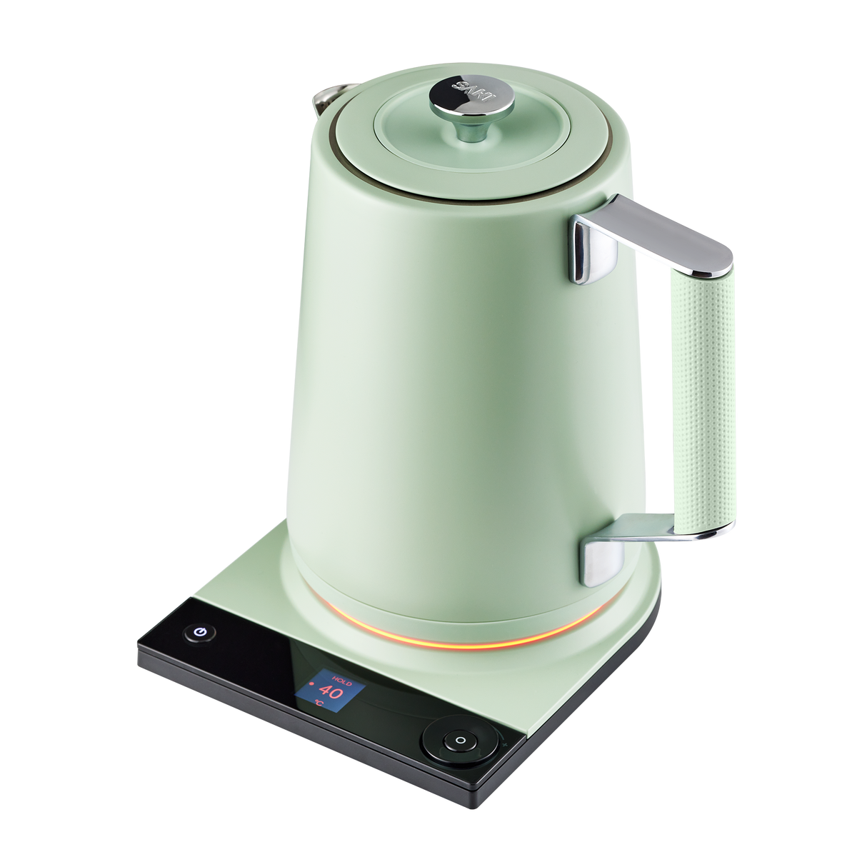 Sage green electric kettle with lid knob, handle, and glowing heating ring on base.