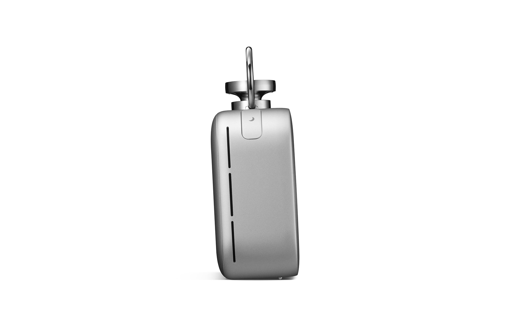 Silver desktop clock side view with vertical seam and side control