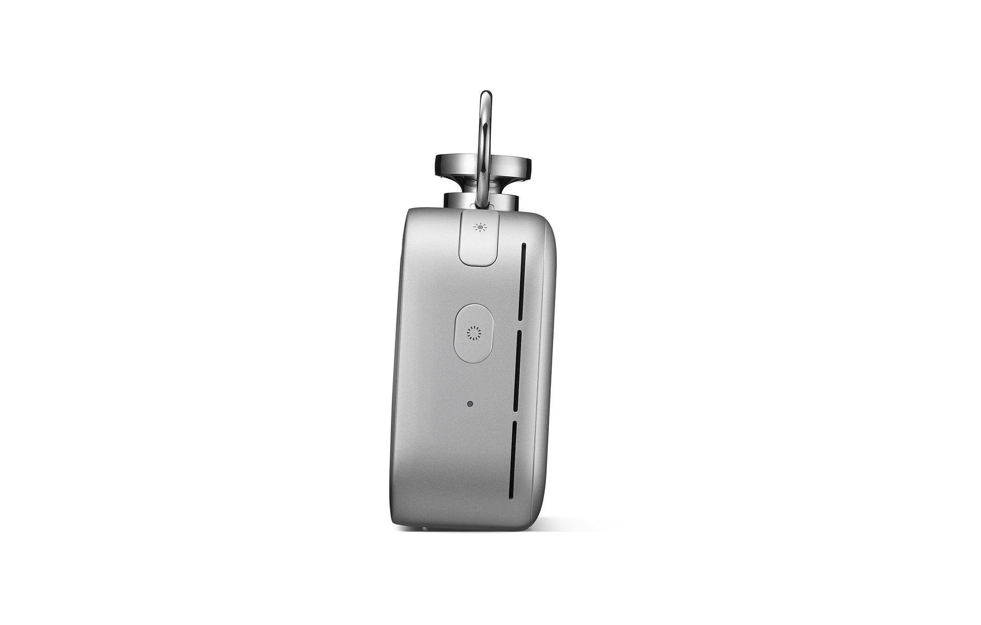 Silver desktop clock angled view with top handle and front control button