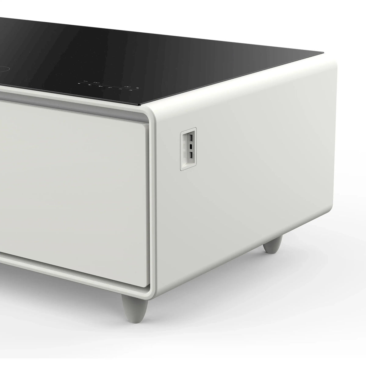 White smart coffee table side view with front drawer edge and small port opening