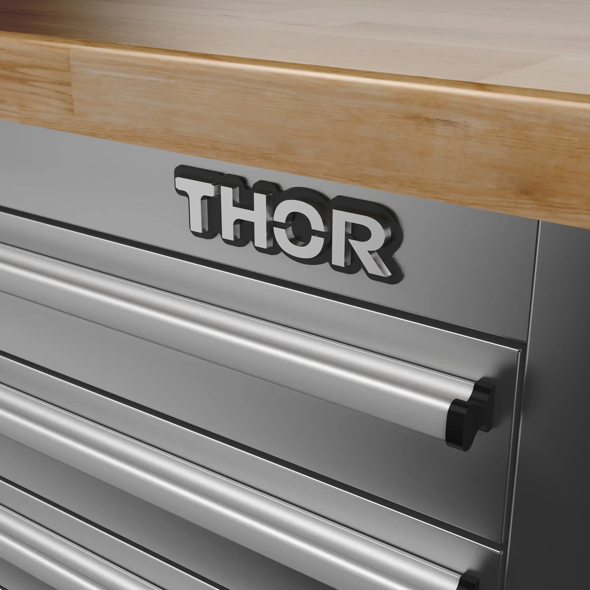 Grey tool workbench drawer face with Thor logo and black pull handle