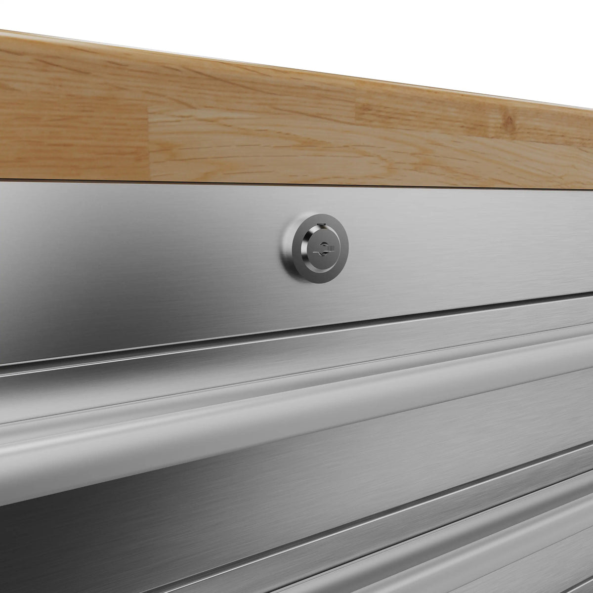 Circular lock knob on metal drawer front above drawer rails