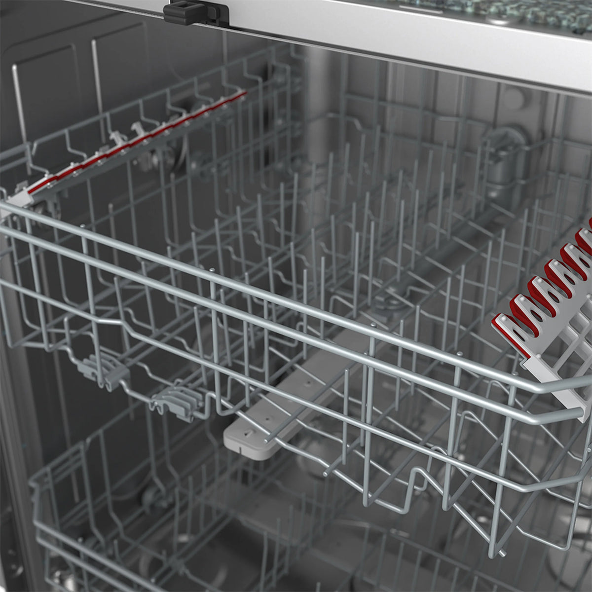Dishwasher interior close-up with lower rack and red-accented spray rails