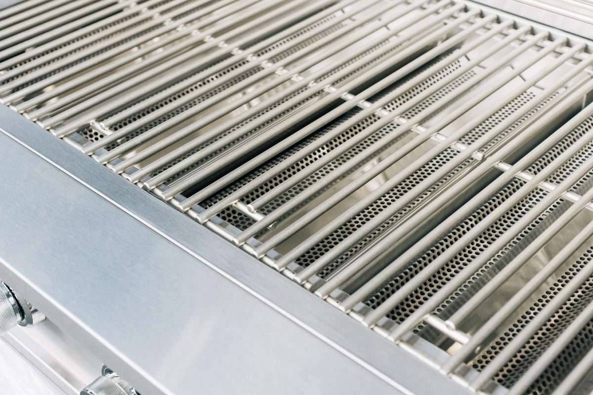Stainless steel cooking grates with drip tray openings