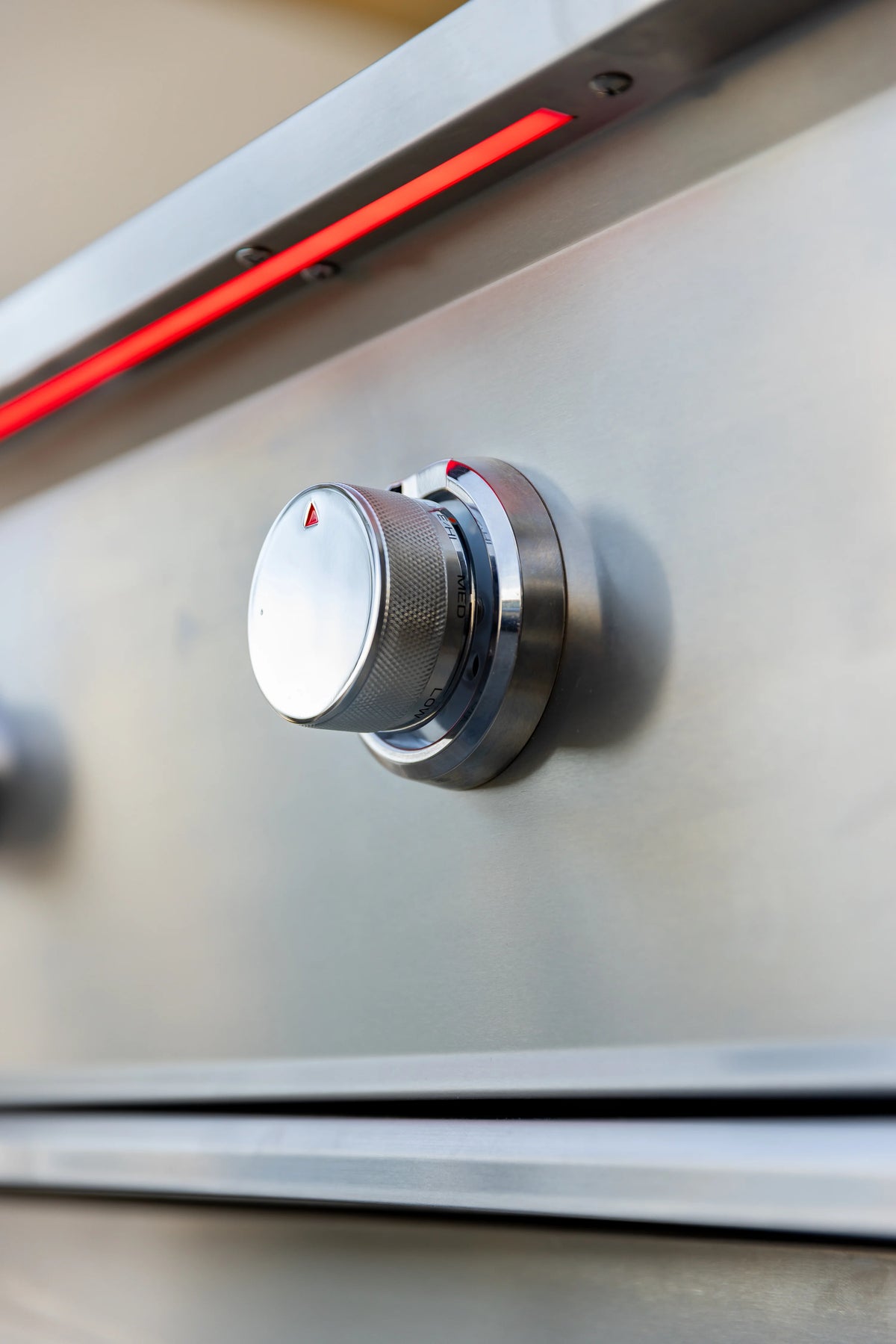 Stainless steel control knob with red indicator glow strip