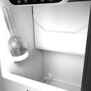 Stainless steel ice maker interior bin with ice scoop and drain area