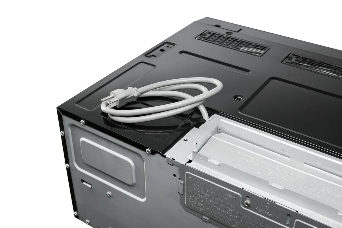 Black electric range interior with white power cord and open door panel