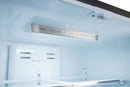 Refrigerator interior with LED light and temperature display control panel.