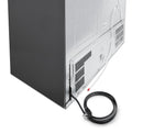 Refrigerator rear access panel with ventilation grilles and attached power cord.