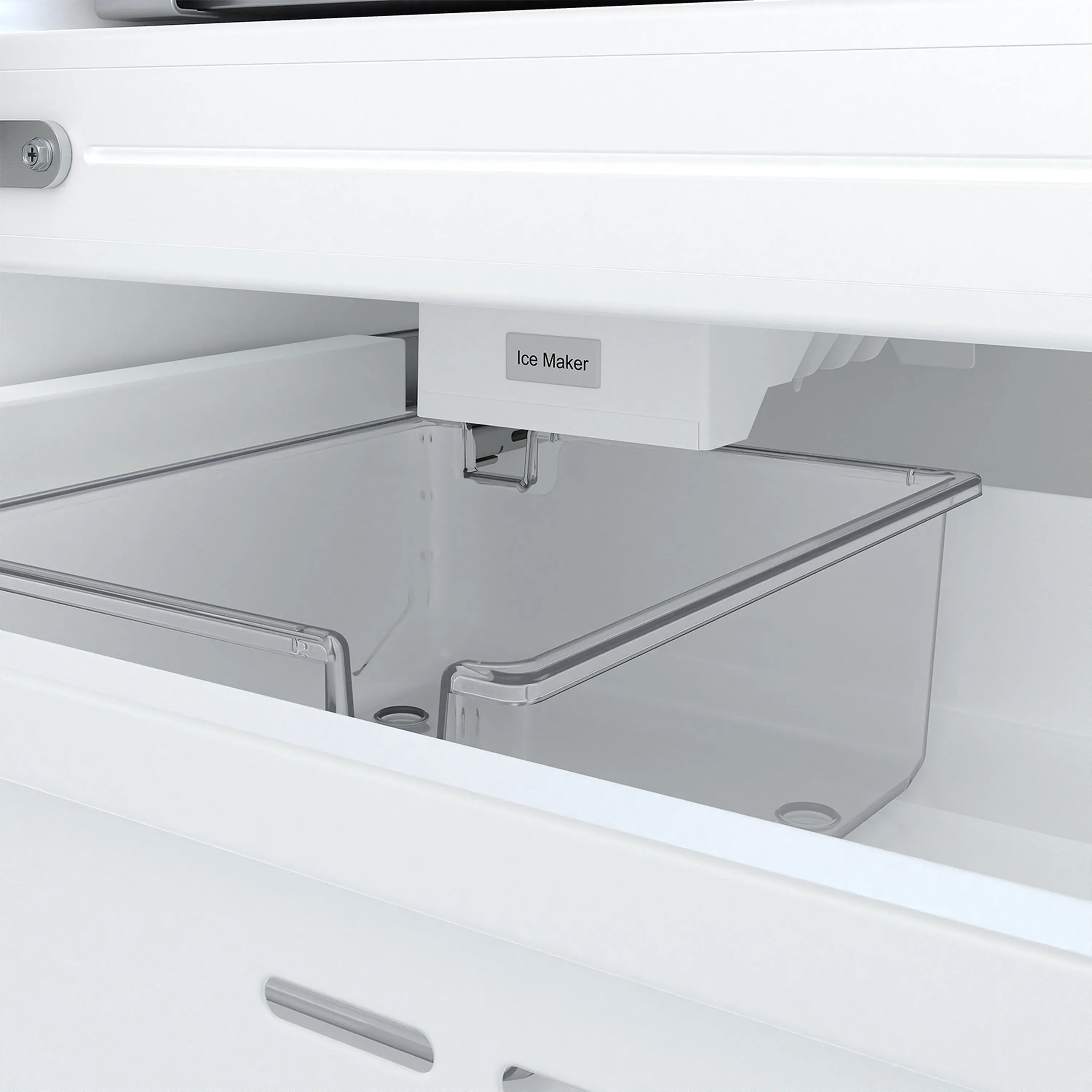 Ice maker area inside stainless 36-inch refrigerator with pull-out shelf