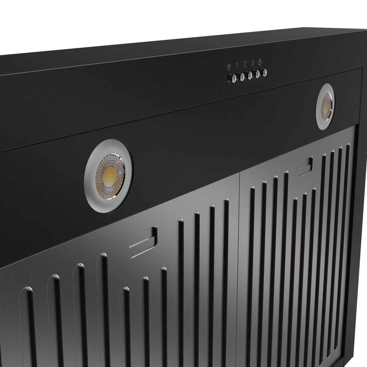 Close-up of black range hood front with circular light openings and vent slots