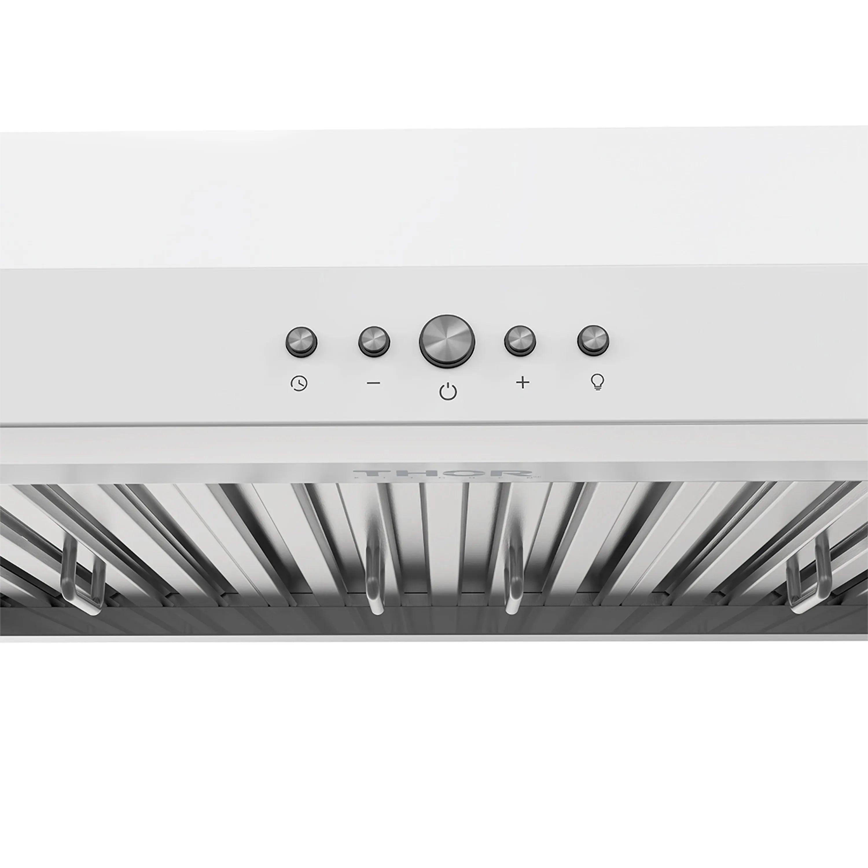 White range hood control buttons above stainless baffle filters and inner vent ducts.