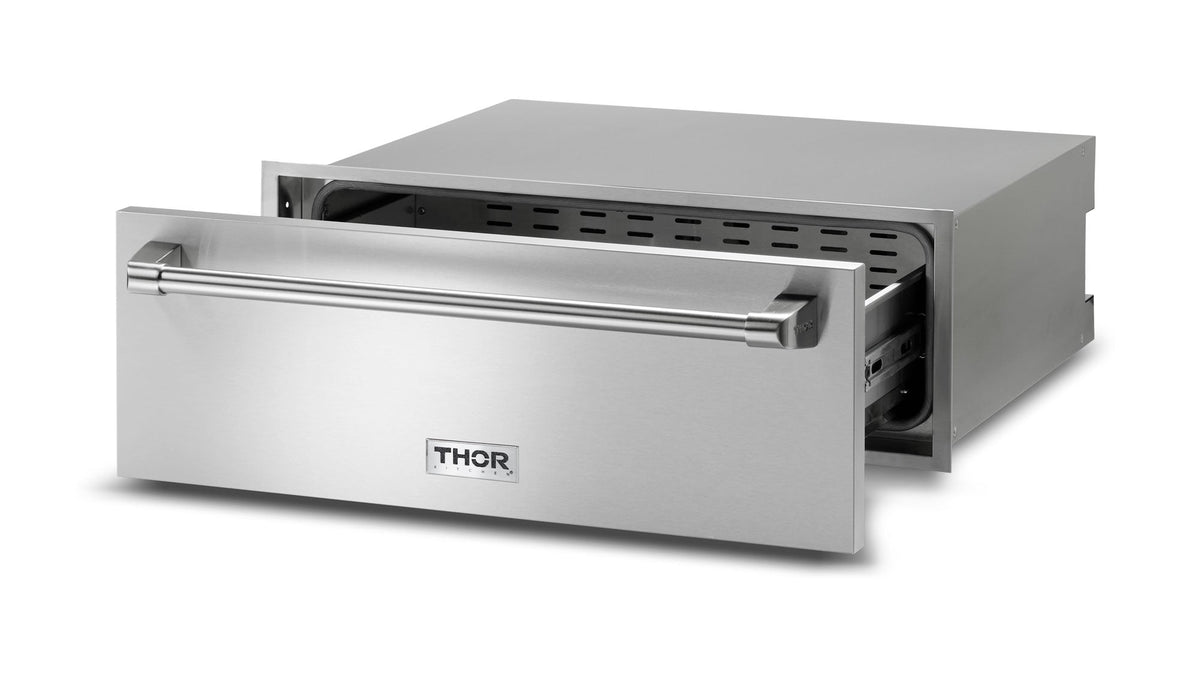 Stainless steel warming drawer open, showing interior racks and THOR logo