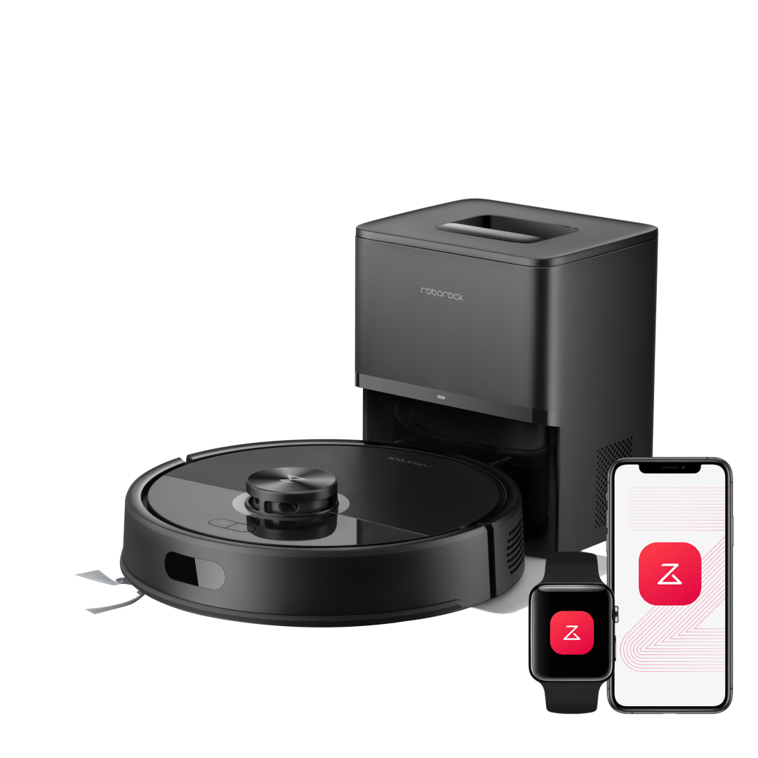 Black robot vacuum with auto-empty dock, shown with smartphone app control
