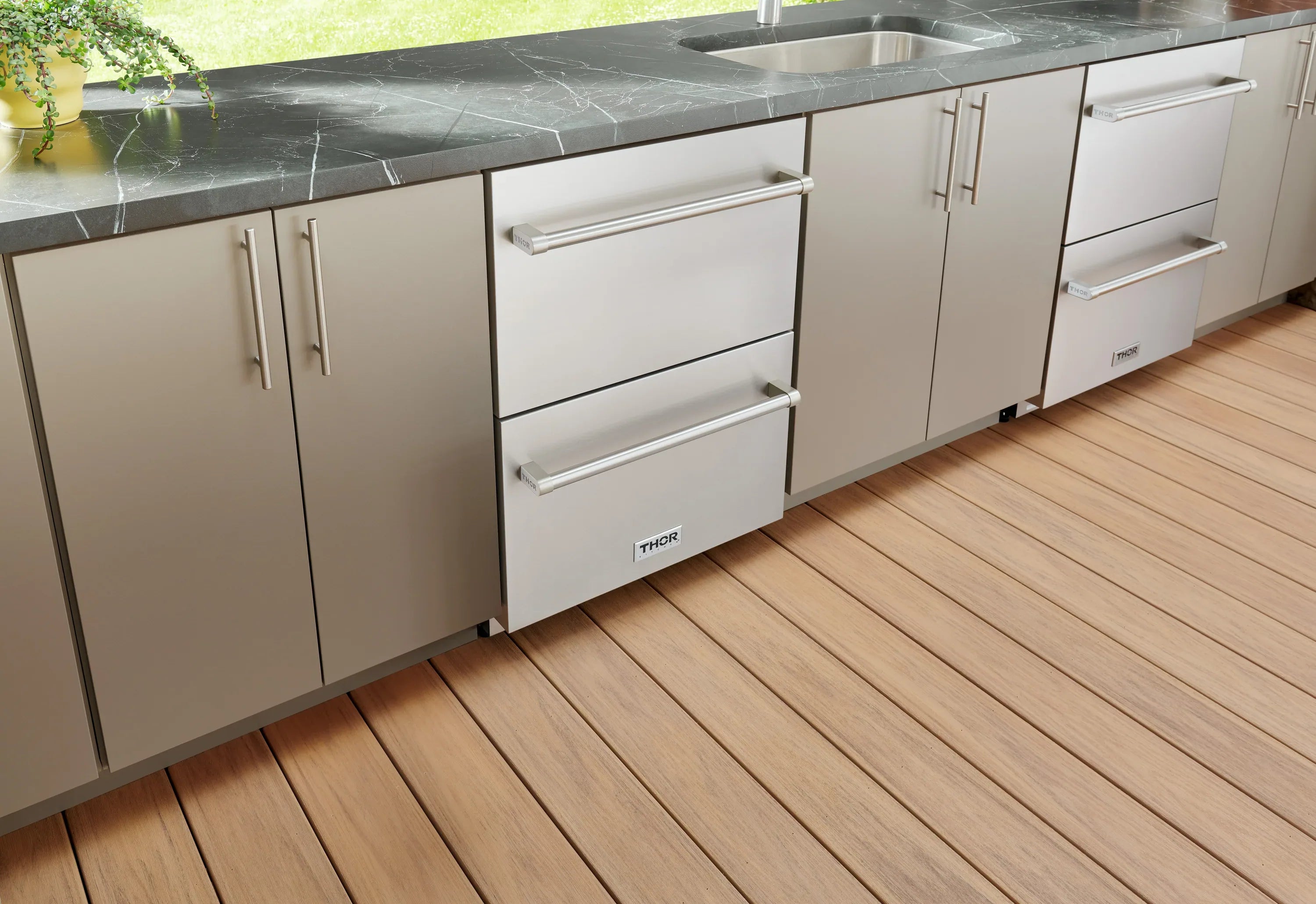 Stainless steel built-in undercounter double drawer refrigerator, side view with drawers closed