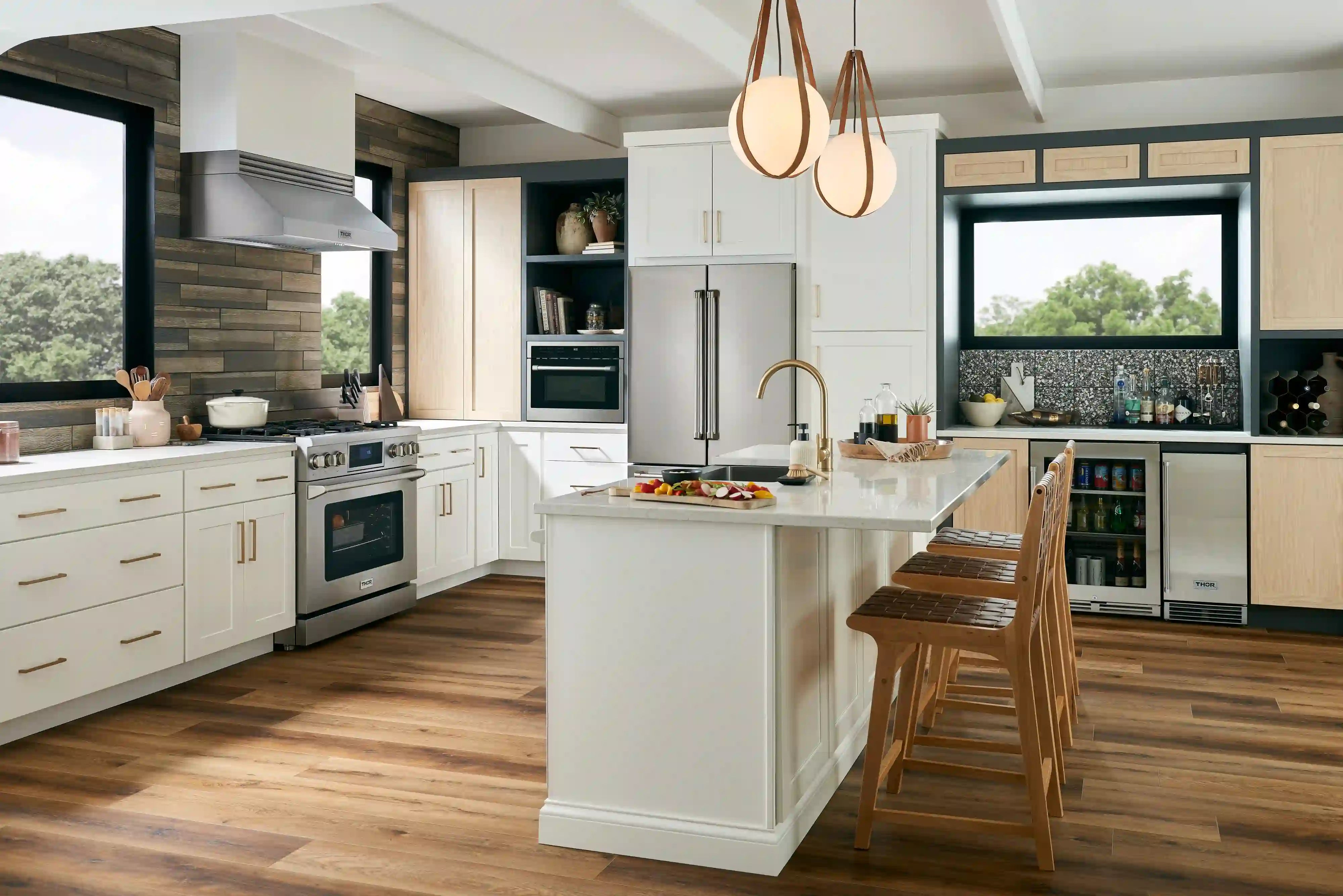Stainless undercounter beverage cooler with glass door installed in kitchen cabinetry