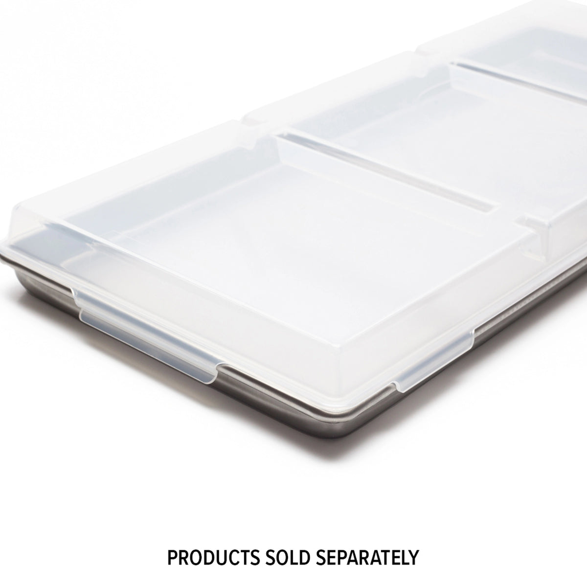 Clear plastic freeze dryer tray with raised inner sections and metal base
