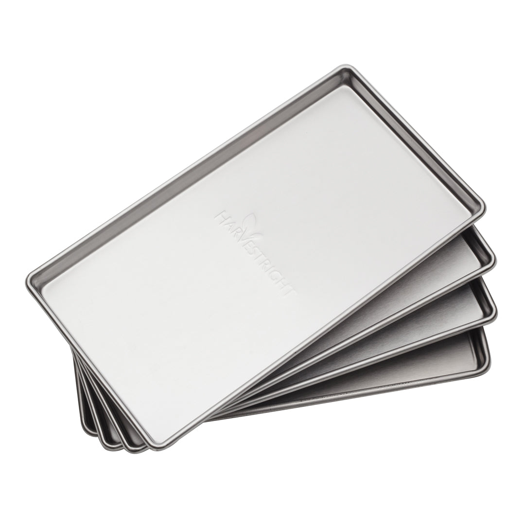 Stacked Harvest Right freeze dryer trays, metallic silver with raised rim edges