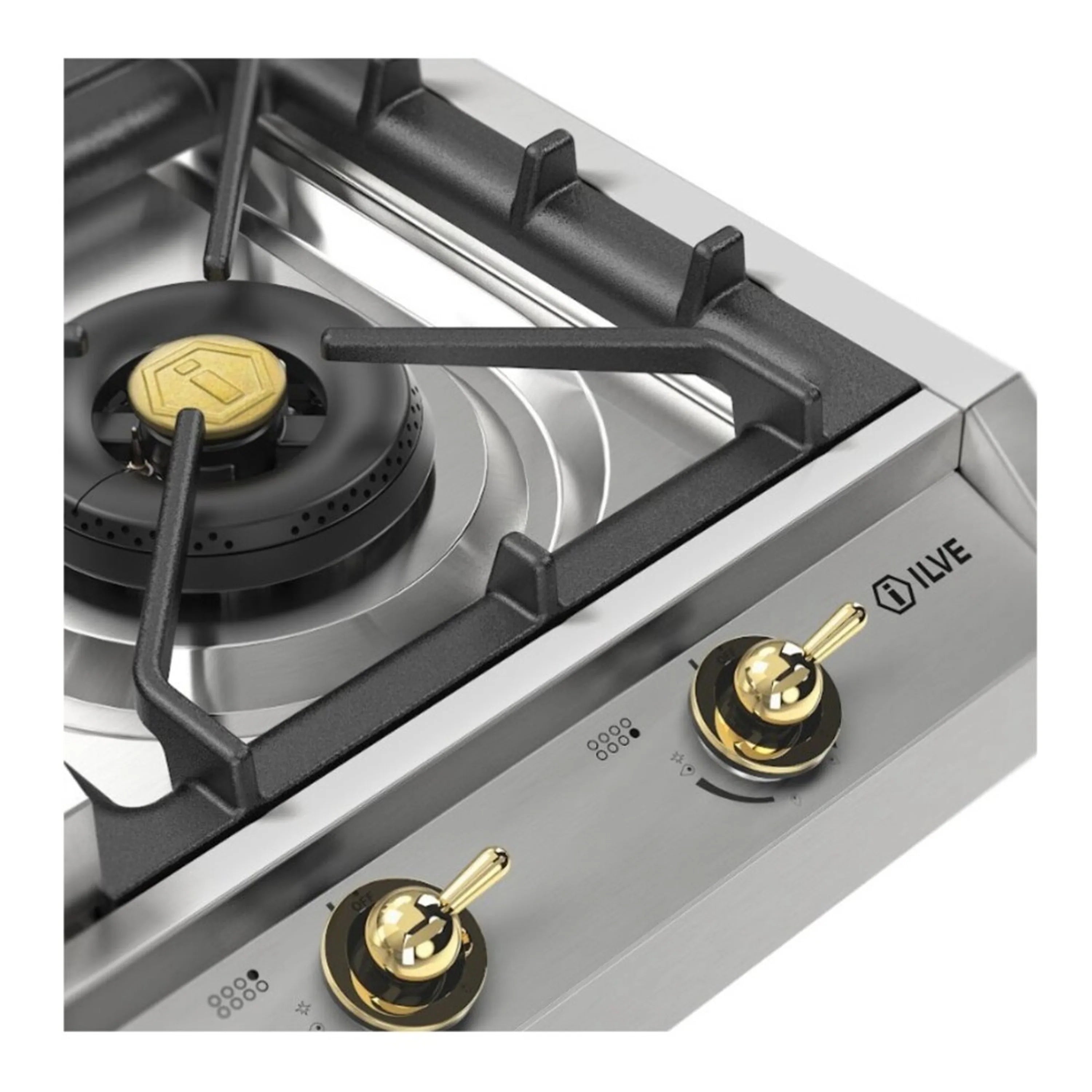 Gas cooktop control area with gold knobs and black burner caps on stainless steel