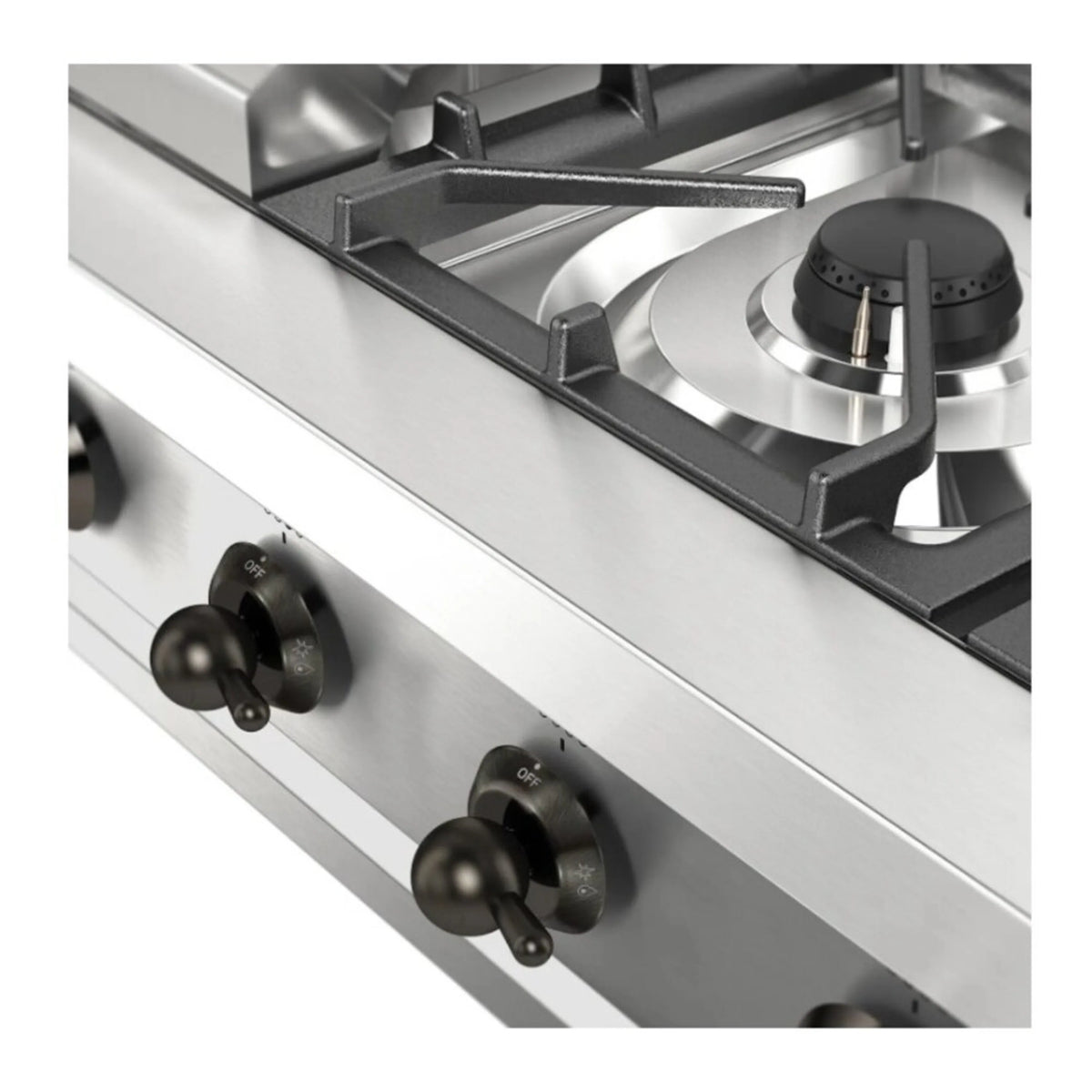 Stainless steel control knobs and burner grates on gas rangetop, close-up