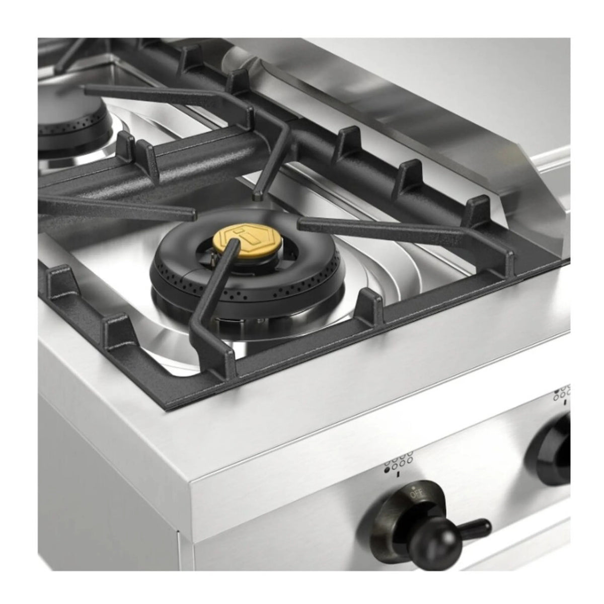 Gas burner head and control knob on stainless steel rangetop, close-up