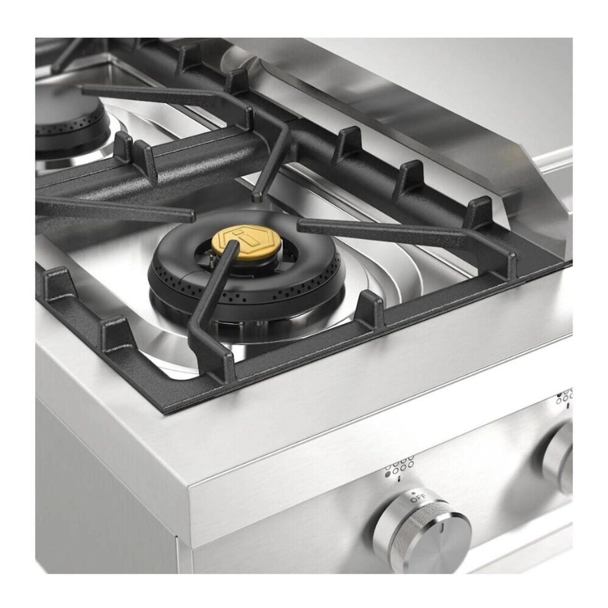 Stainless steel burner head with black grate and yellow cap on propane rangetop