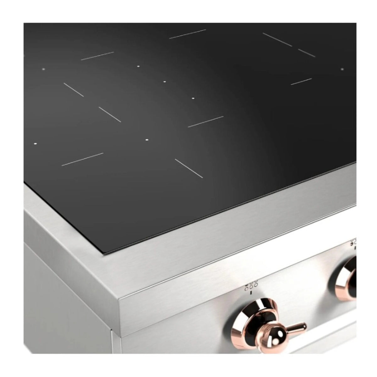 Built-in induction cooktop close-up: black glass top edge and copper knob controls