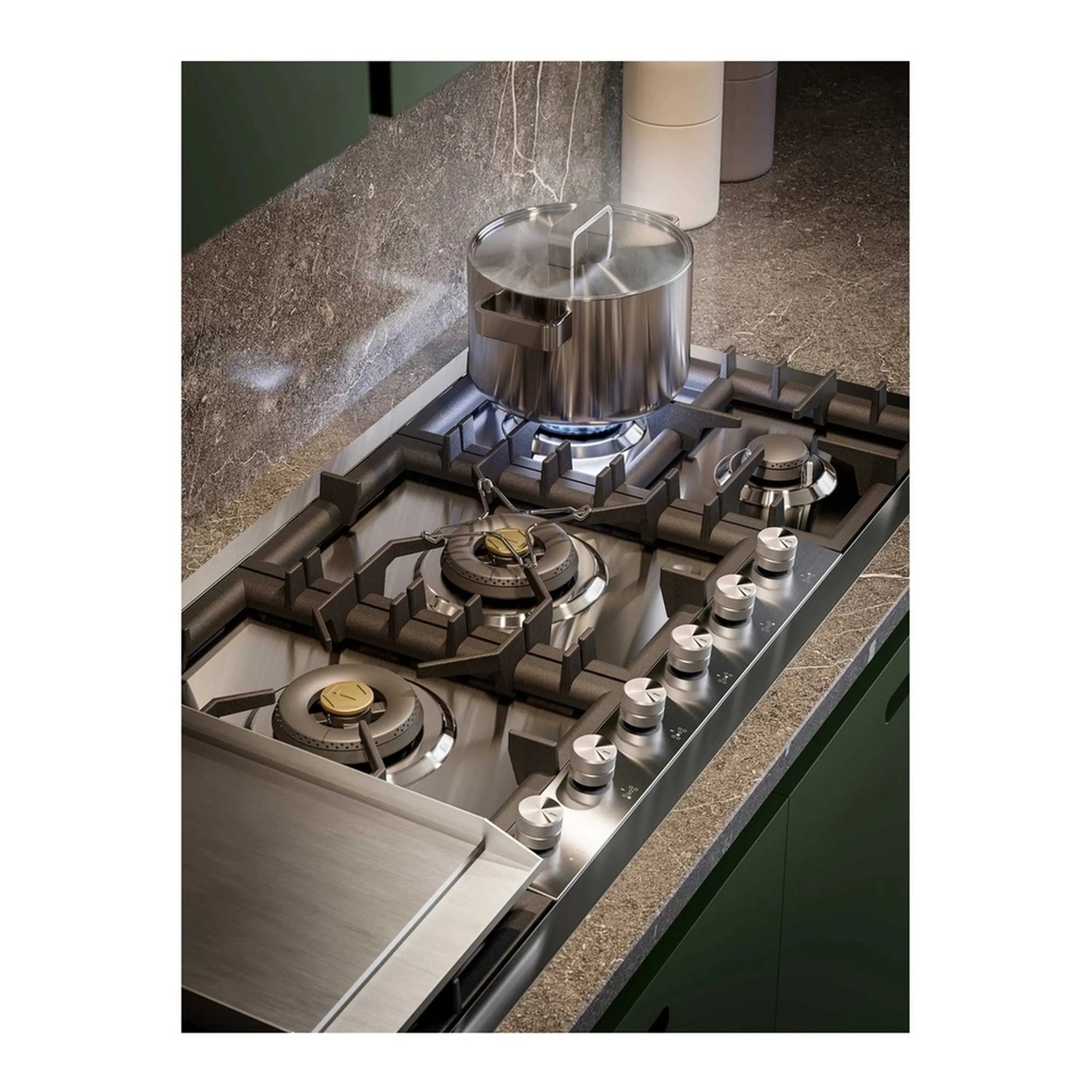 Stainless steel built-in propane gas cooktop with black grates and brass-cap burners