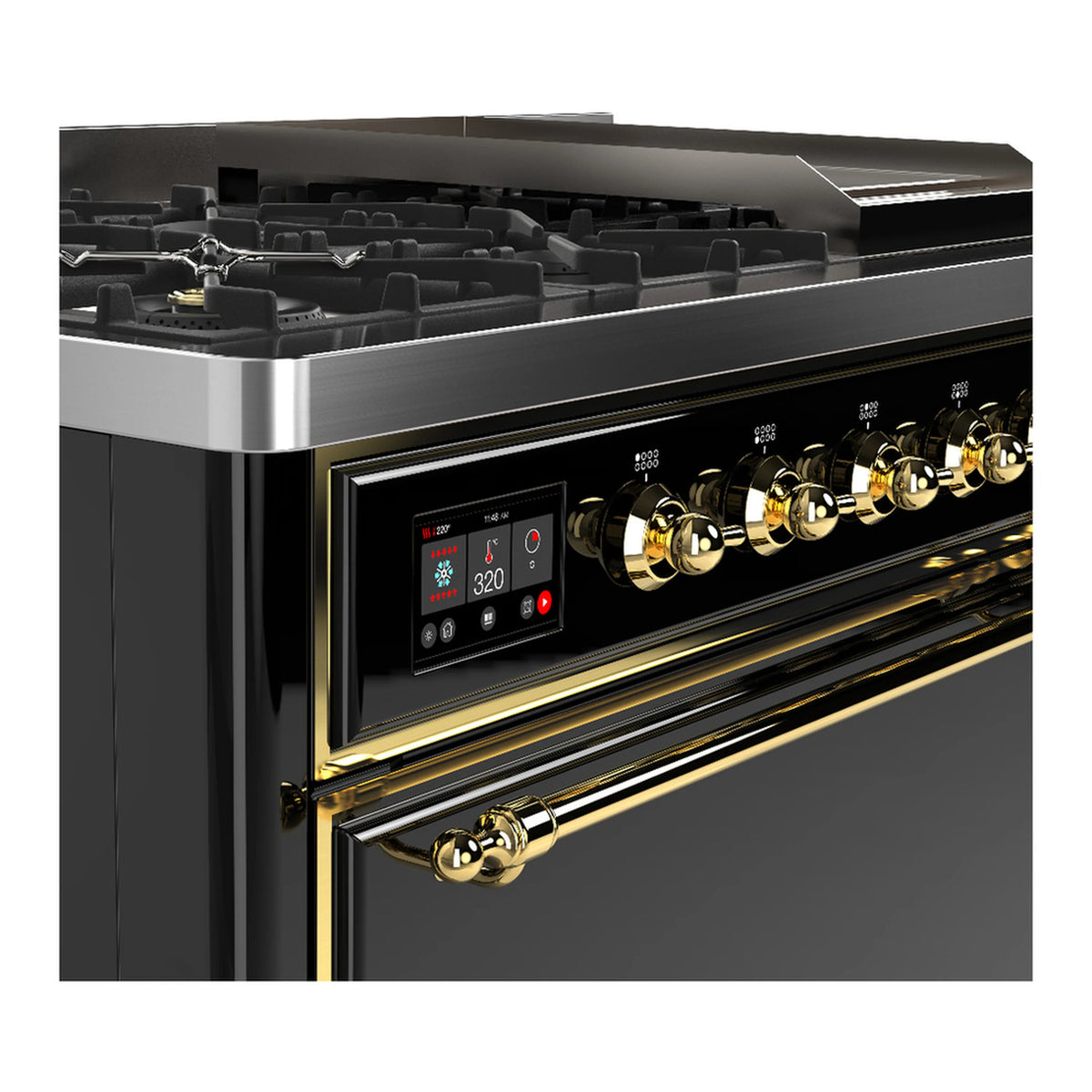 Dual fuel range close-up of brass control knobs and glossy black oven door panel