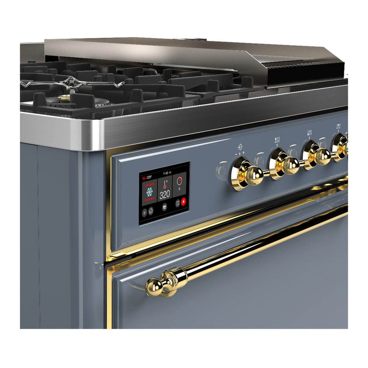 Close-up of blue grey dual fuel range control panel with brass knobs and handle trim.