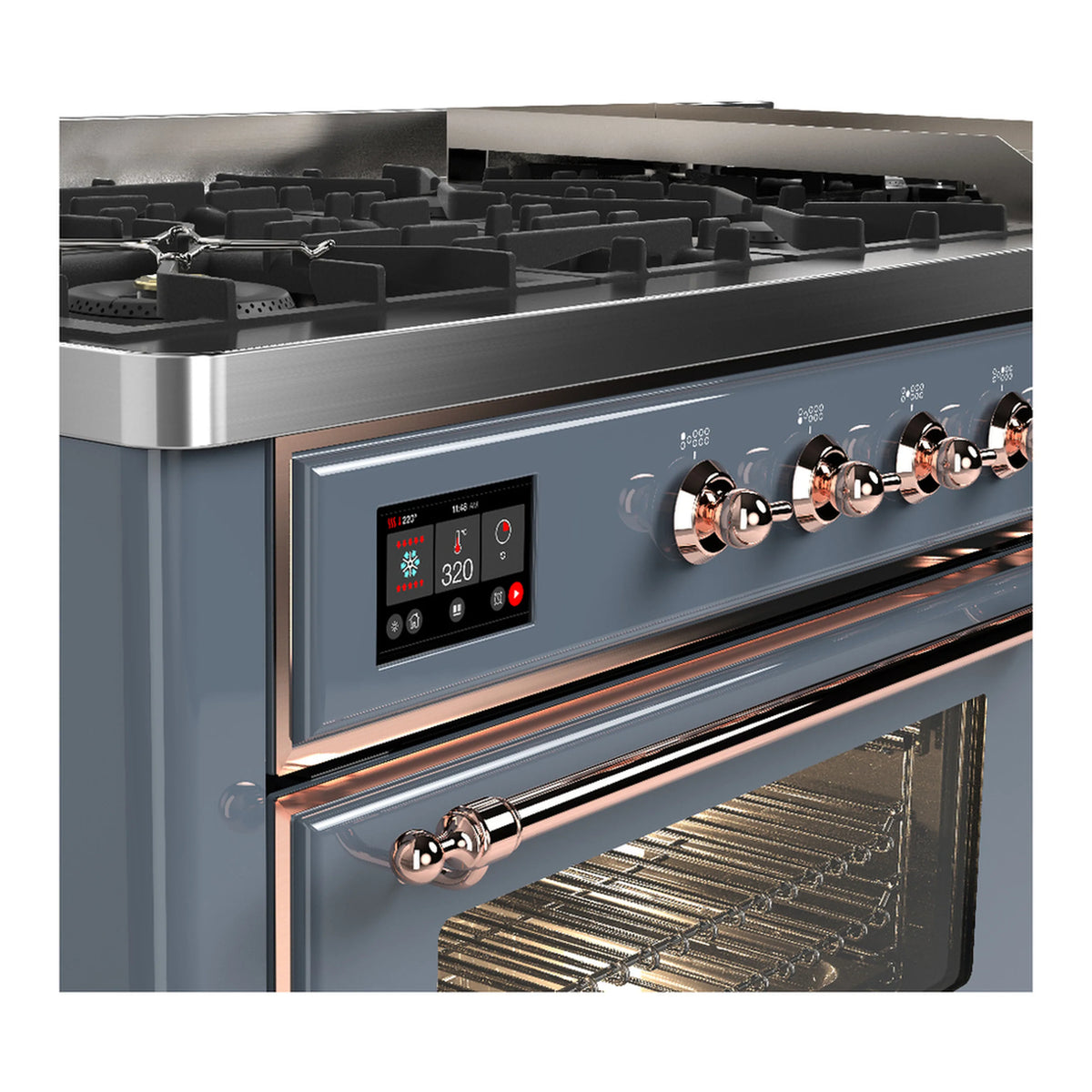 Blue-grey dual fuel range control panel with copper knobs and open oven door glass
