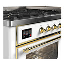ILVE Majestic III 60-inch Dual Fuel Range with 7 Natural Gas Burner, Griddle and Triple Glass Door Electric Oven in White with Brass Trim (UM60FNR3WHG)