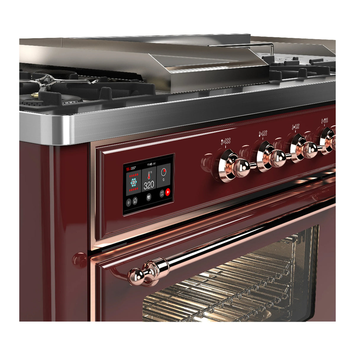 Burgundy dual fuel range side control panel with copper knobs and glass oven door